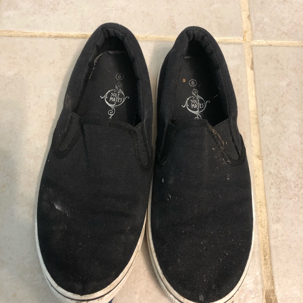 Used black slip ons